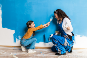 a family painting their home electric blue